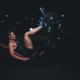Frau auf Beinpresse: vastus medialis trainieren