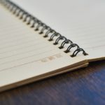 Notizbuch als Trainingstagebuch im Krafttraining